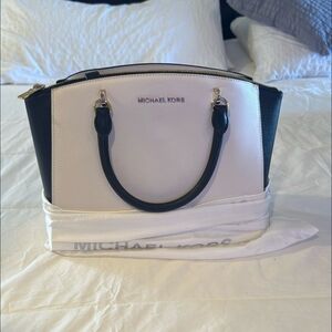 Michael Kors Black and White Satchel with Structured Elegance